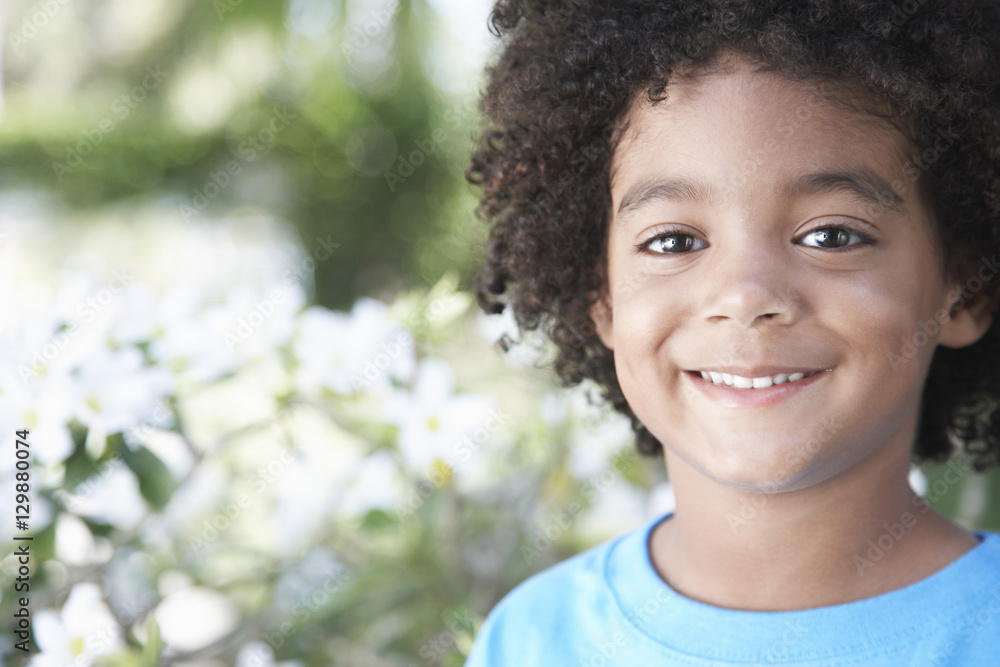 Closeup portrait of cute boy smiling outdoors Closeup portrait of cute boy smiling outdoors