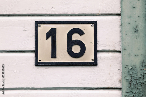 House number sign number sixteen