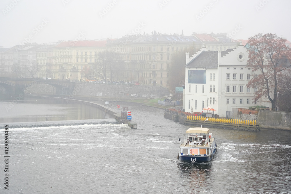 Prague,  Czechia - November, 24, 2016: Ship on Vitava river in Prague, Czechia