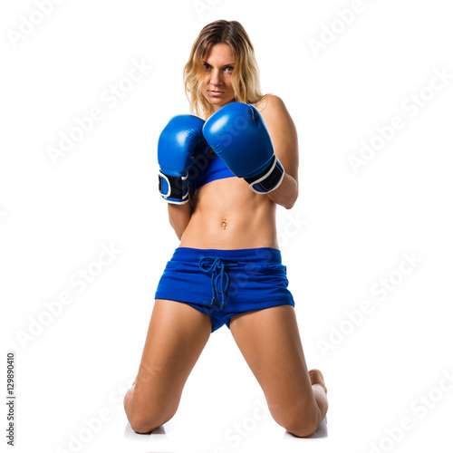 Pretty blonde woman with blue boxing gloves © luismolinero