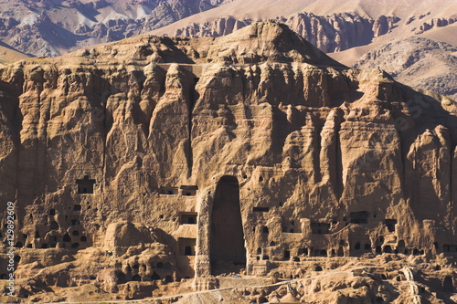 Empty niche in the cliff where one of the famous carved Buddhas once stood, destroyed by the Taliban in 2001, Bamiyan, Bamiyan province, Afghanistan photo