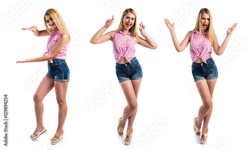 Blonde girl doing surprise gesture