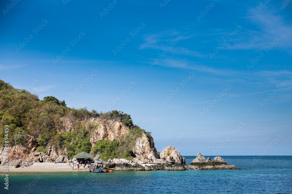 Small island in the middle of the sea and blue sky. Small island in the middle of the sea and blue sky.