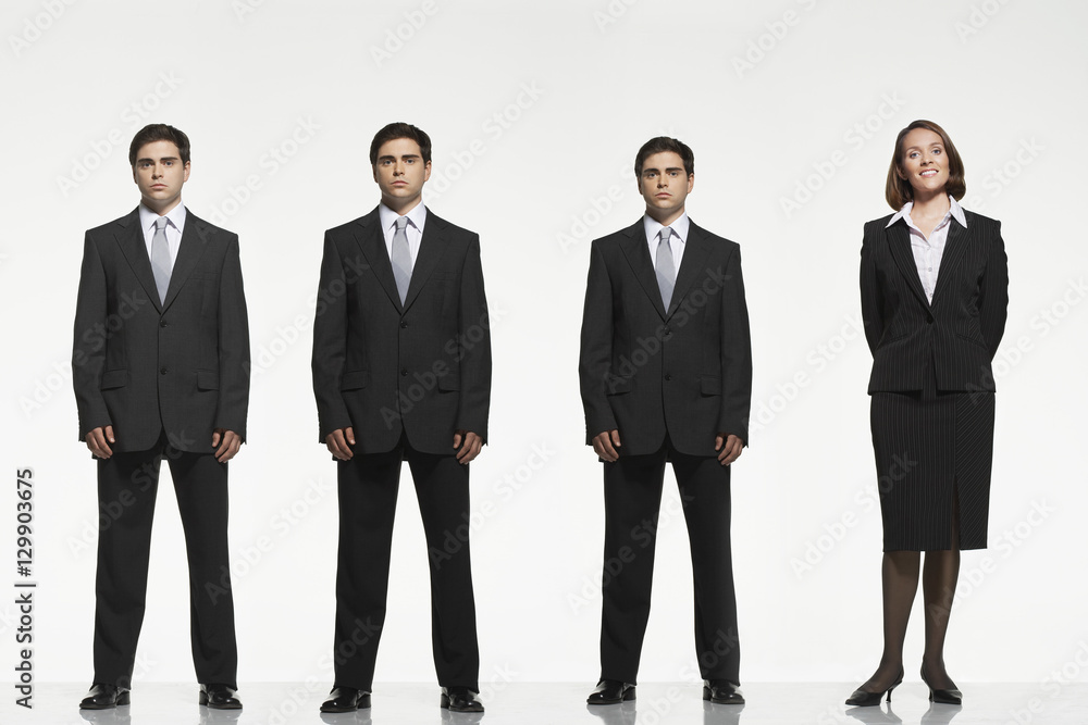 Full length portrait of businesspeople standing side by side against white background Full length portrait of businesspeople standing side by side against white background