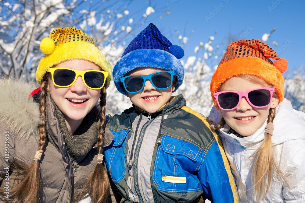 Happy little children playing in winter snow day. Happy little children playing in winter snow day.