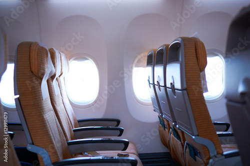 Empty airplane seats in the cabin