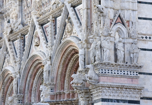 Ornamental statuary on facade of the Cathedral of Santa Maria Assunta, Siena, Tuscany