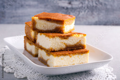 Stack of pumpkin cheesecake bars