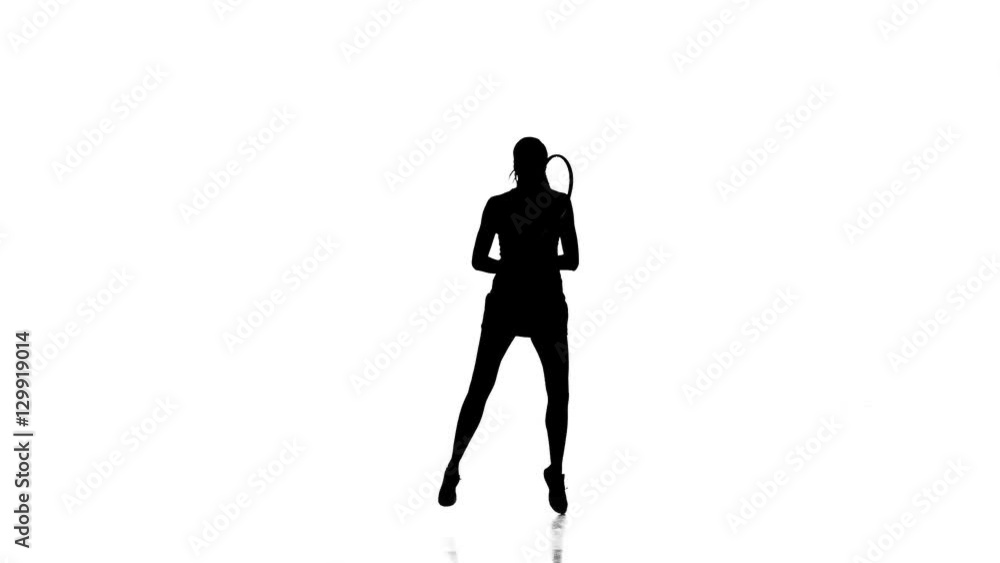 Girl playing tennis in the sports form. White background. Silhouette Girl playing tennis in the sports form. White background. Silhouette