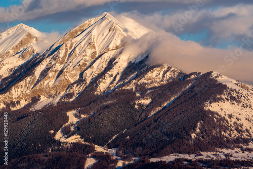 Sunset on the Petite and Grande Autane mountain peaks. Champsaur, Hautes Alpes, Southern French Alps, France photo