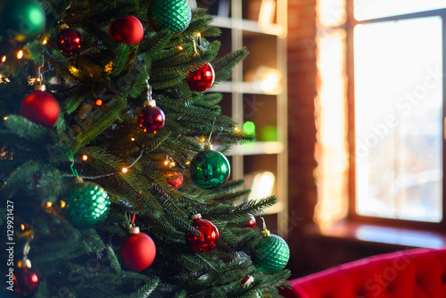 Christmas morning in the living room with the Christmas tree and gifts