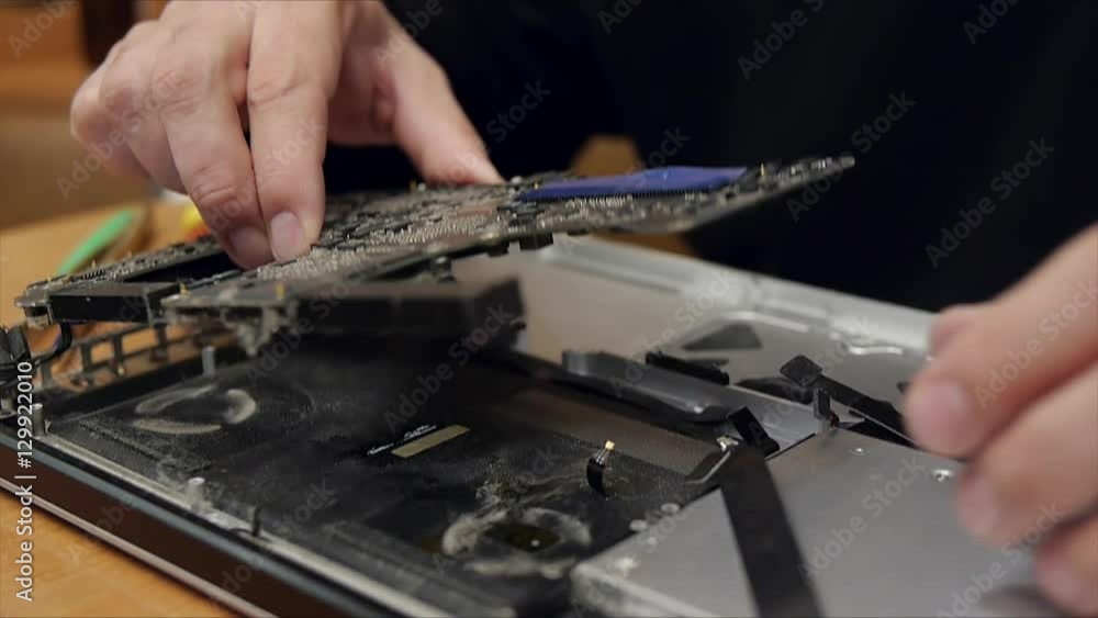 Notebook motherboard mounting during service repairing Notebook motherboard mounting during service repairing