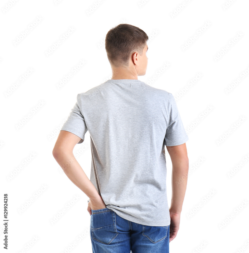 Fototapeta premium Handsome young man in blank grey t-shirt on white background