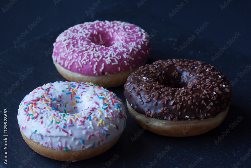 donuts on a black background