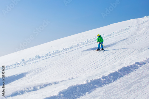 Ski and snow fun for kids in winter mountains