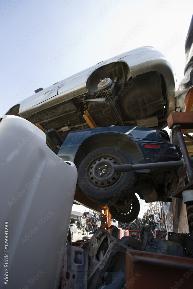 custom made wallpaper toronto digitalLow angle view of obsolete cars at an automotive junkyard