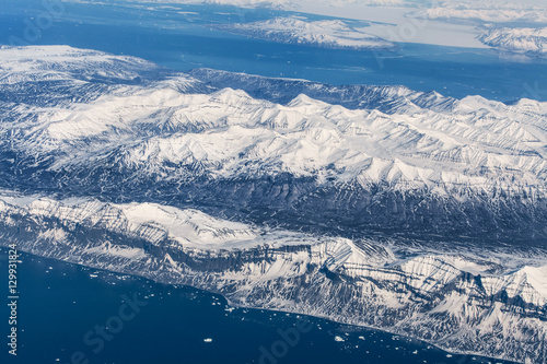 Aerial view over ice mountains in Greenland