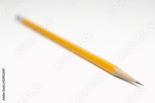 Yellow pencil isolated over white background