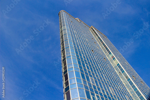 Exterior of glass residential building open windows. Glass Facad