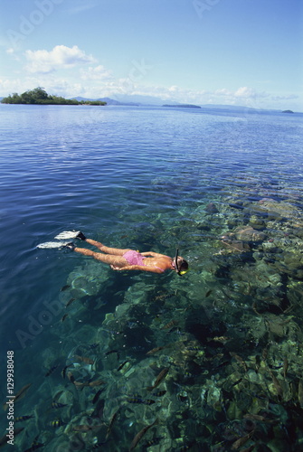 Tourist snorkelling in Marovo Lagoon, Solomon Islands Islands photo