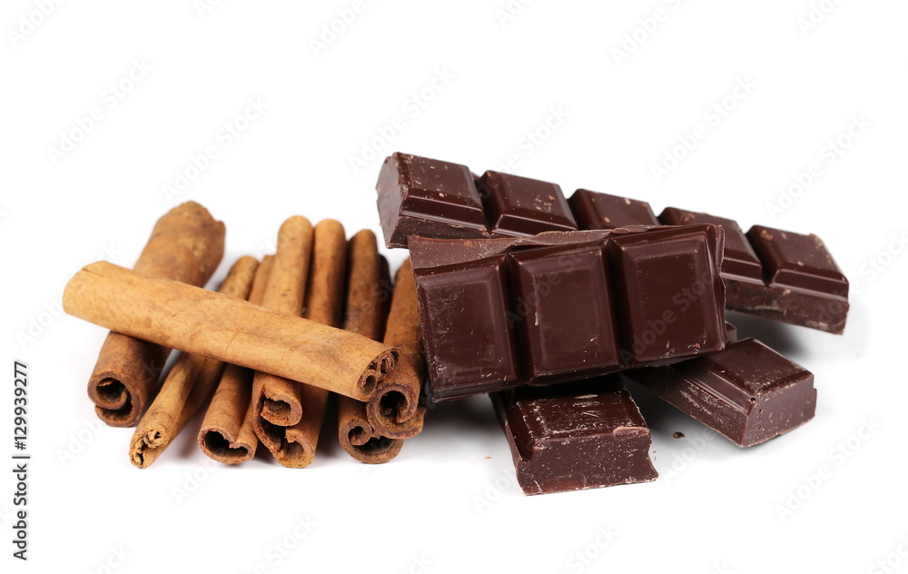 chocolate bars with cinnamon sticks and pile cocoa powder isolated on white chocolate bars with cinnamon sticks and pile cocoa powder isolated on white