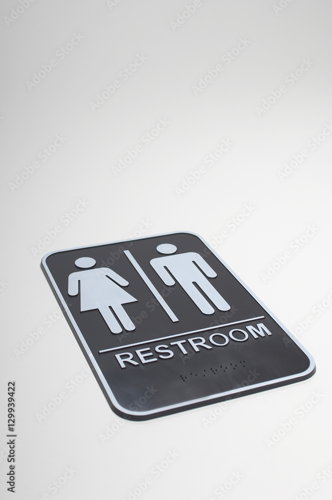 Isolated restroom sign over gray background Isolated restroom sign over gray background