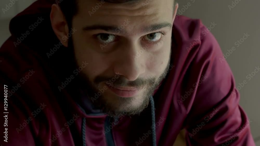 drug addict with bags under eyes smiles with mouth closed drug addict with bags under eyes smiles with mouth closed
