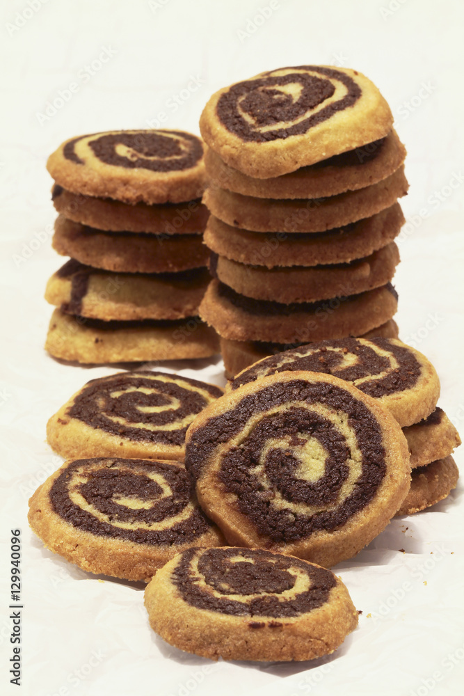 Chocolate Vanilla Swirl Cookies Stacks on Parchment Chocolate Vanilla Swirl Cookies Stacks on Parchment