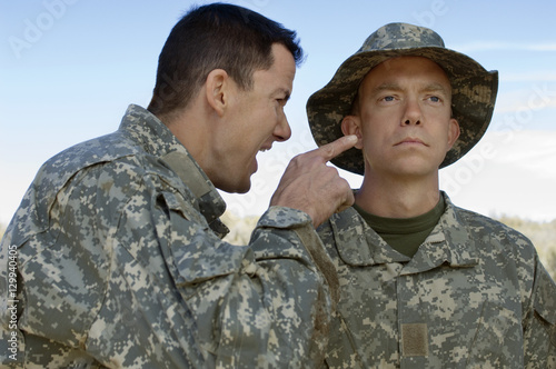 фотографія Military solider shouting at teammate during a training session