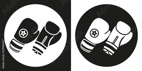Boxing gloves icon. Silhouette boxing gloves on a black and white background. Sports Equipment. Vector Illustration.