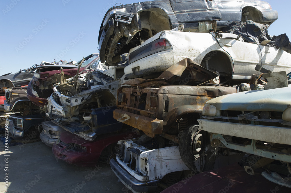Stack of damaged cars in a junkyard Stack of damaged cars in a junkyard