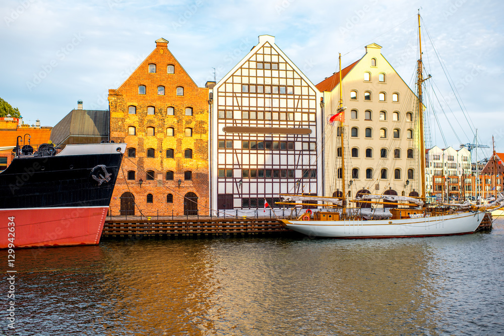 Naklejka premium Beautiful half-timbered houses on the riverside in the old town of Gdansk, Poland