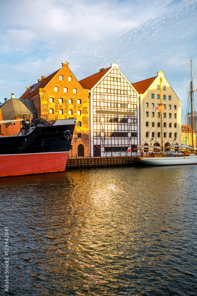 Naklejka premium Beautiful half-timbered houses on the riverside in the old town of Gdansk, Poland