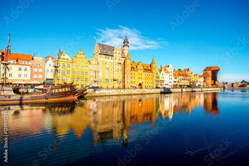 Morning view on the riverside of Motlawa river with beautiful buildings of the old town in Gdansk, Poland