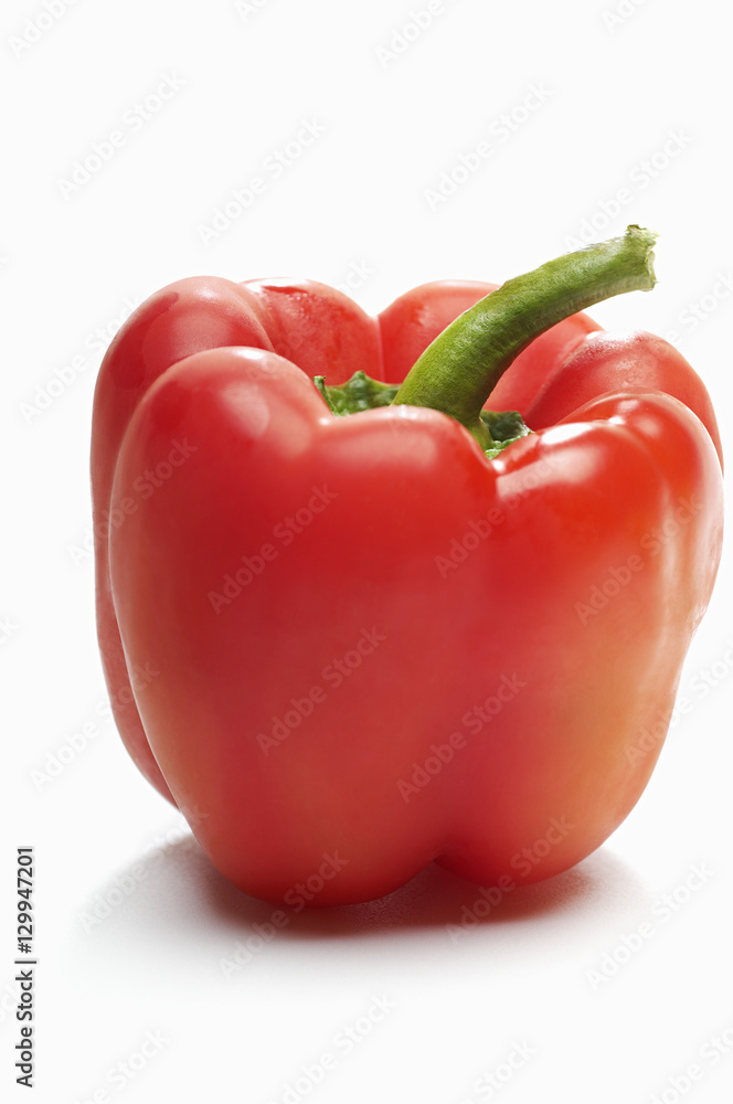 Closeup of a red bellpepper isolated over white background Closeup of a red bellpepper isolated over white background