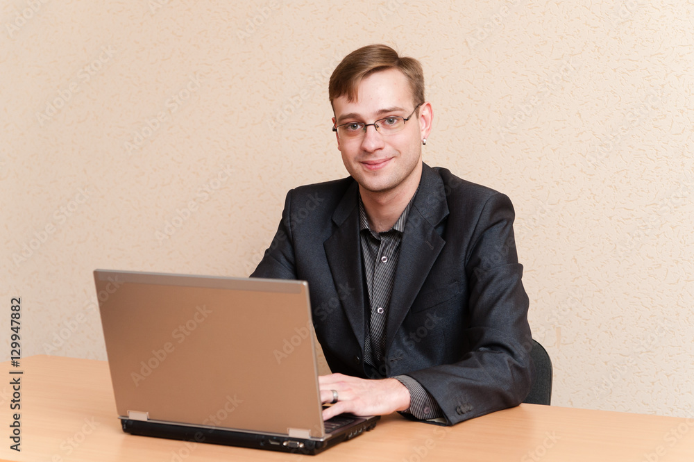 Businessman working on a laptop Businessman working on a laptop