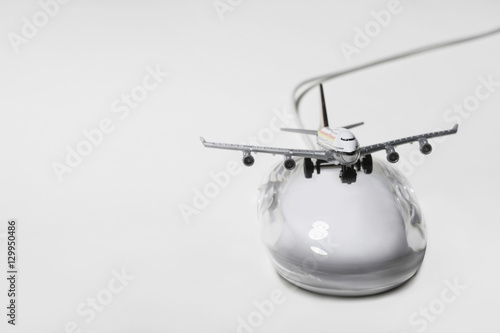Jumbo jet on apple macintosh computer mouse digital composite © moodboard