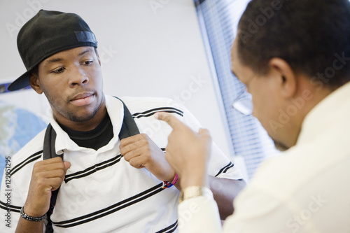 Fotografie High school teacher reprimanding a male student