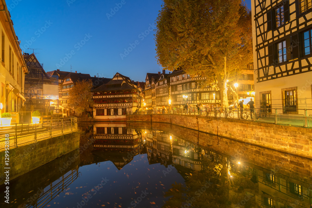 Petit France medieval district of Strasbourg illuminated at night, Alsace France