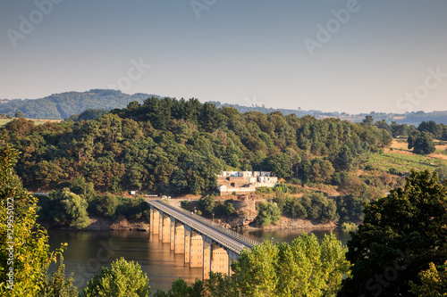Roman bridge over the Minho River in Portomarin photo