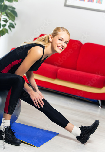 woman exercising indoors