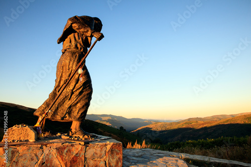 Bronze statue of a pilgrim photo