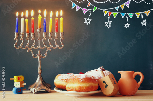 Image of jewish holiday Hanukkah with menorah photo