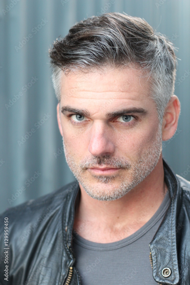 Mature handsome Caucasian man with gray hair Mature handsome Caucasian man with gray hair