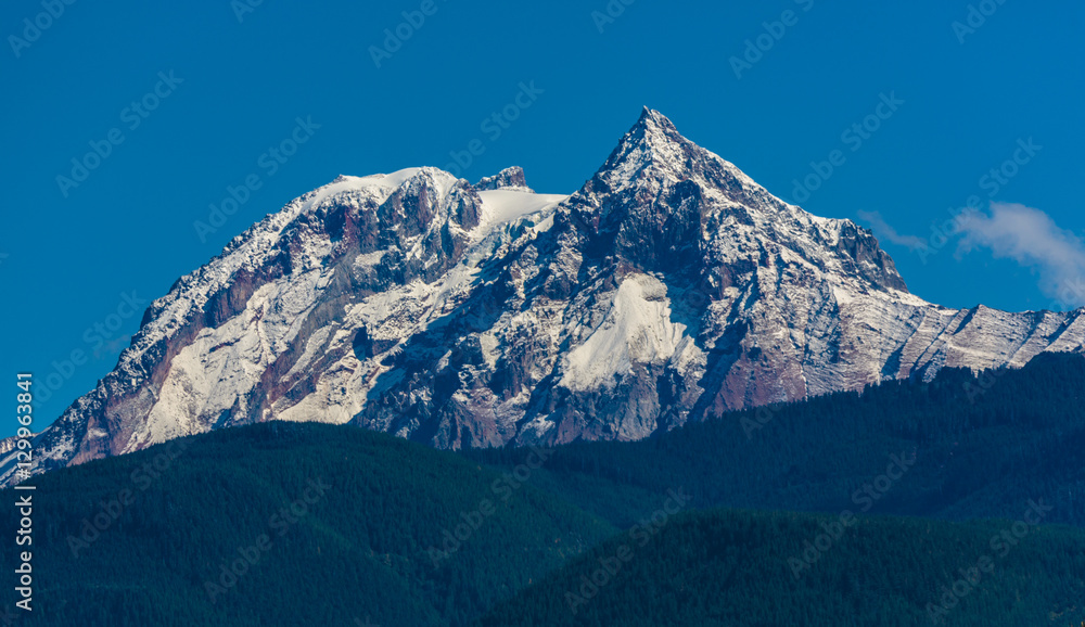 Squamish, BC, Canada - Sept. 21, 2016: Rising to an elevation of 2678 meters, Mt. Garibaldi offers a spectacular backdrop to the small town of Squmish in the Howe Sound.