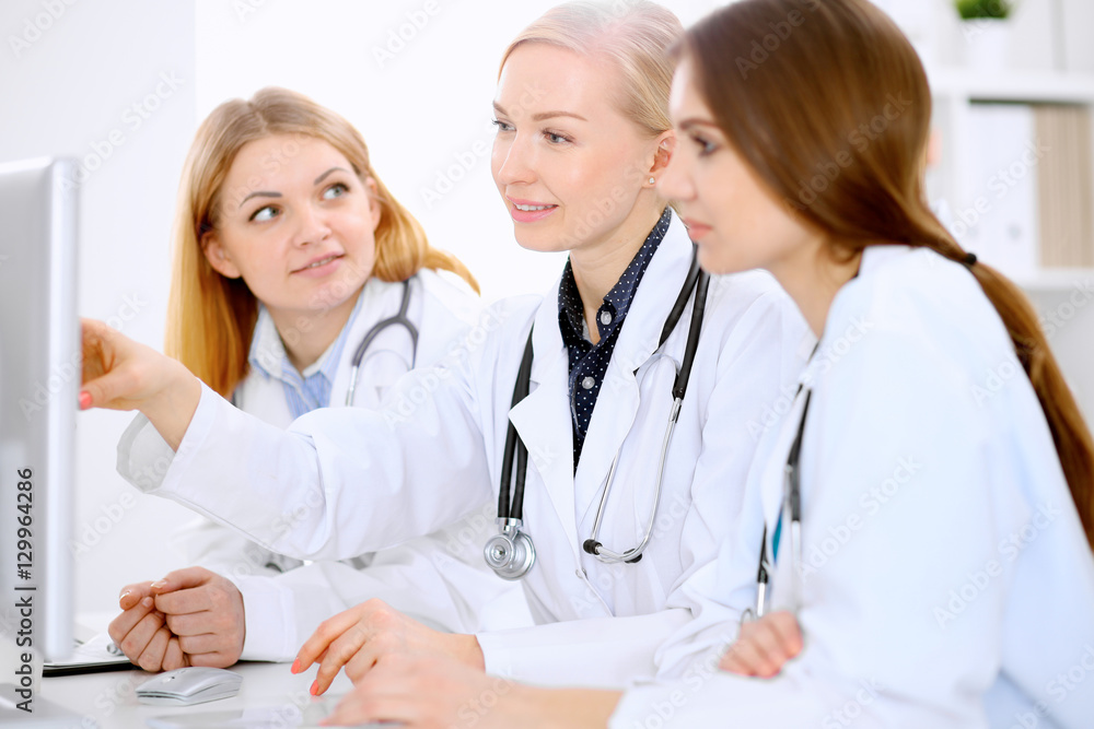 Female doctor leading a medical team at the hospital Female doctor leading a medical team at the hospital
