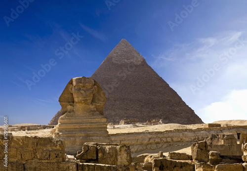 The famous ancient Egypt Cheops pyramid and sphinx in Giza