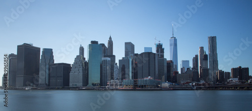 New York financial district with skyscrapers over East River
