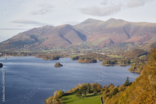 View across Derwent Water to Keswick and Skiddaw from Watendlath road in autumn, Borrowdale, Lake District National Park, Cumbria photo
