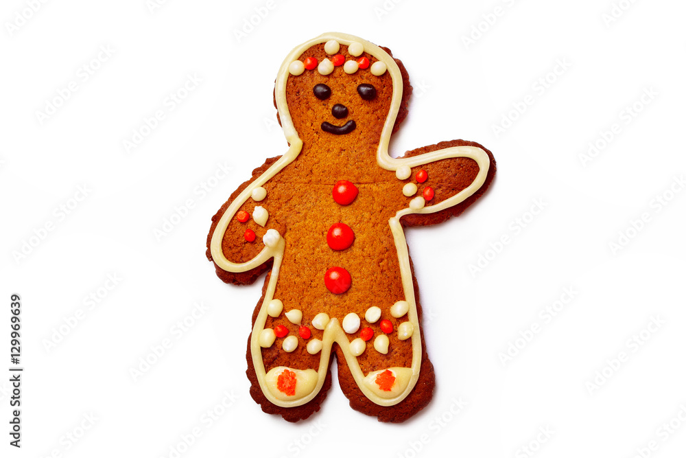 Closeup image of gingerbread man isolated at white background.